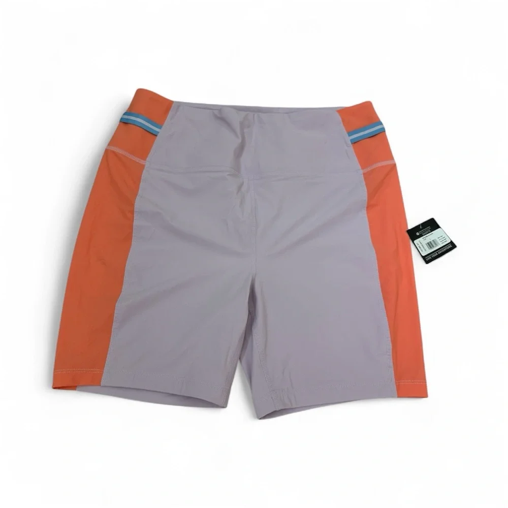 Two Pieces Of Eddie Bauer Lilac and Peach Sports Bra and shorts